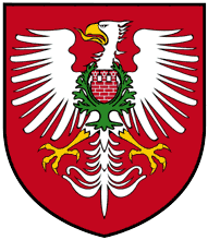[Międzychód coat of arms]